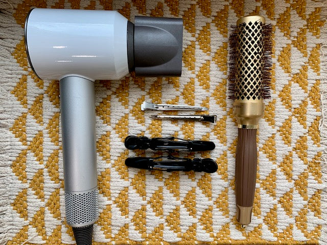 blow dryer and round brush with clips